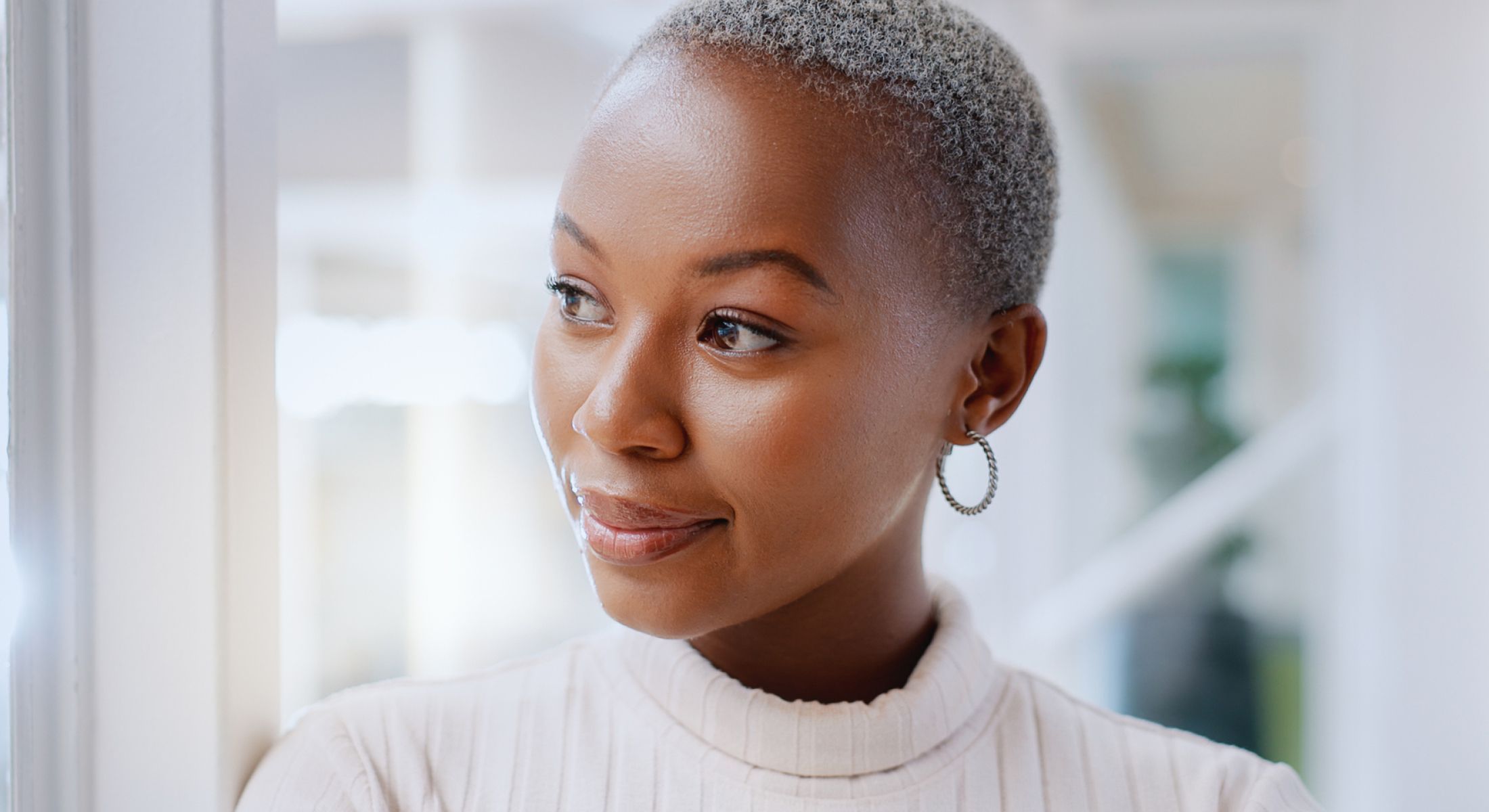 skin tightening patient model in a white sweater